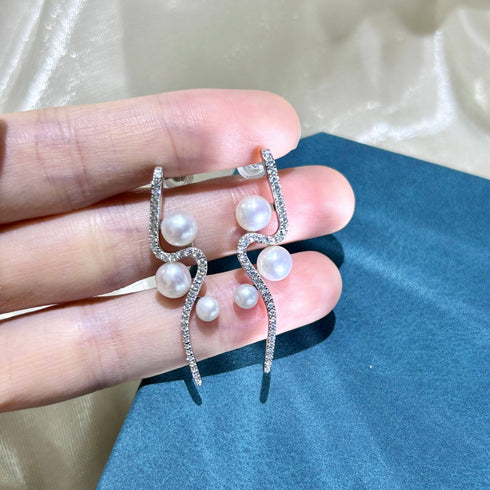 Elegant Curve 925 Silver & Freshwater Pearl Studs - House Of Pearls